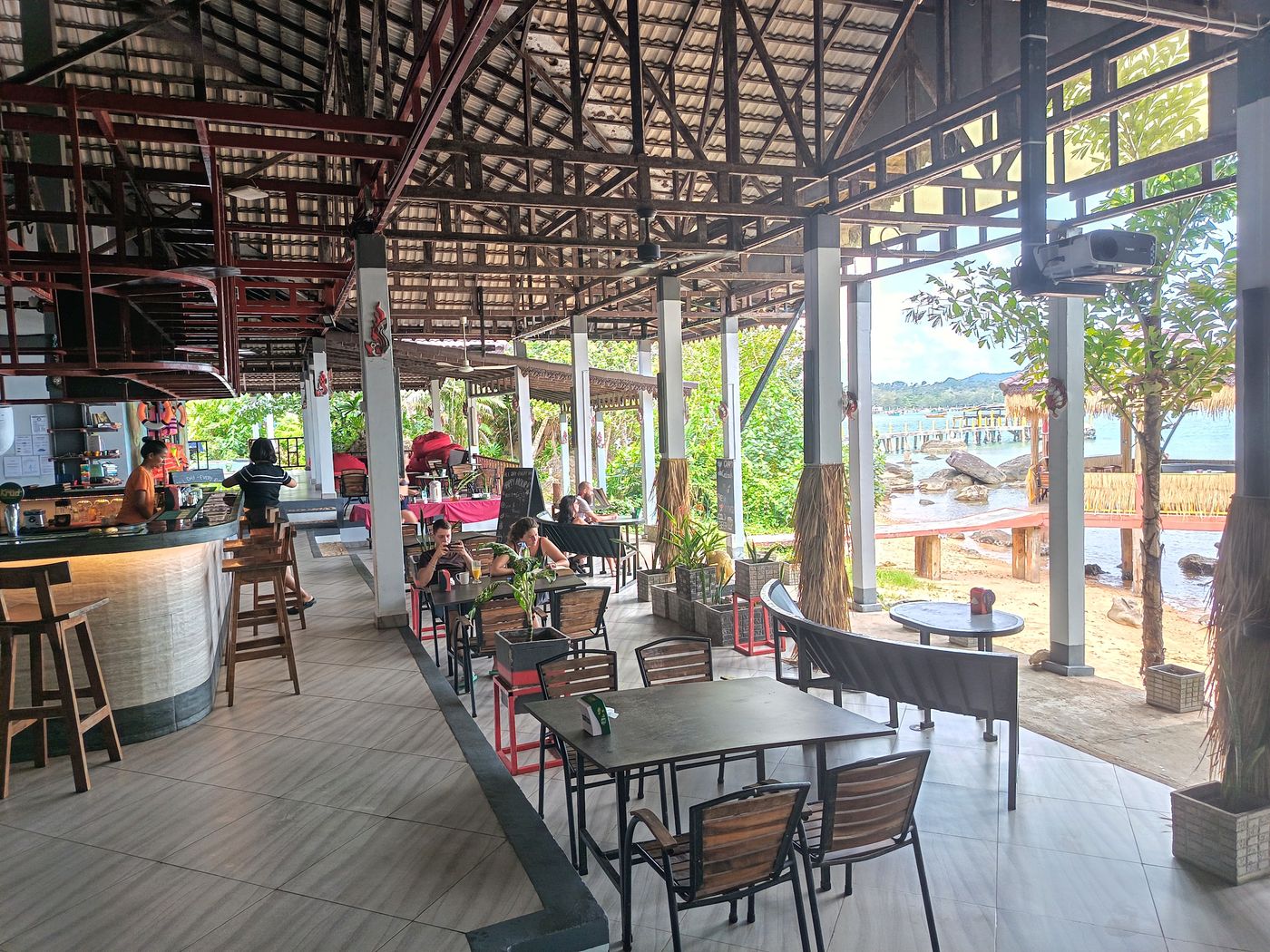Restaurant and shared dining area overlooking the water